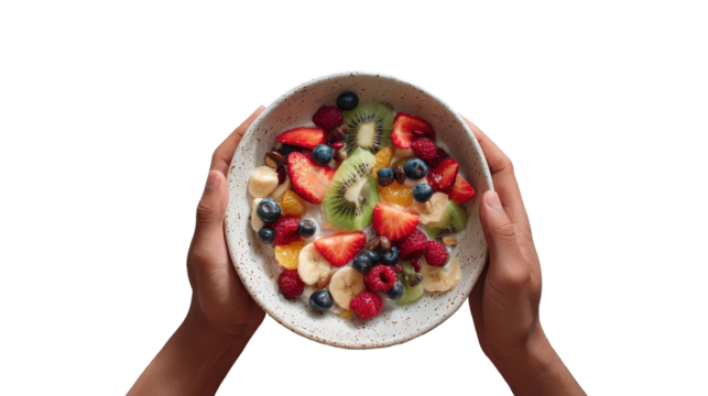 Harmony of Flavors: A vibrant bowl, overflowing with a medley of fresh, colorful fruits is held delicately by a pair of hands, suggesting an invitation to a sensory feast. - Powered by Adobe