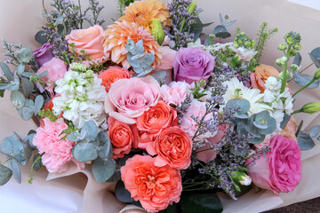 Close up rose blossom bouquet on white background