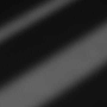 Una toma de cerca de un fondo abstracto de color gris  y negro con un degradado ligero desenfocado