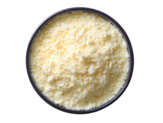 Shredded cheese fills a blue bowl, seen from directly above