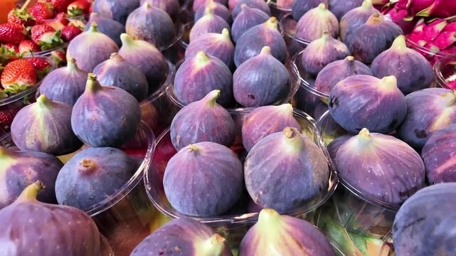 Fresh figs displayed at a local market for sale