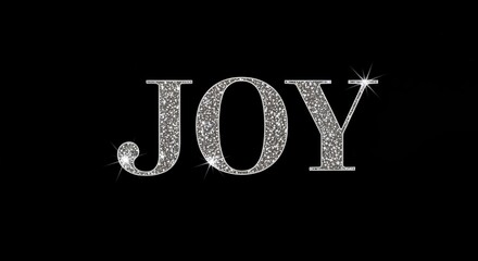 Sparkling JOY: A radiant JOY in glittering typography. The image captures the essence of happiness and delight against a dark backdrop.