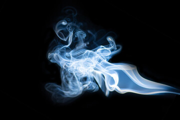 Fototapeta premium Blue hot horizontal curly steam smoke isolated on black background. Abstract background, design element, for overlay on pictures. Create mystical Halloween photos, for overlay on pictures