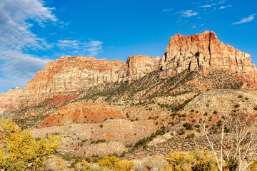 Zion National Park Stunning Red Rock Cliffs with Fall Foliage as seen from the Viewpoint in Springdale Utah.
