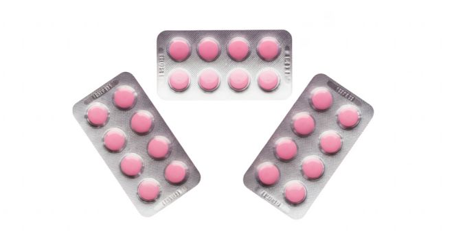 Pink pills in three silver blister packs arranged neatly, signifying medicine and health.