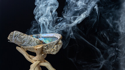 White Sage Smudging Ceremony with Abalone Shell and Rising Smoke