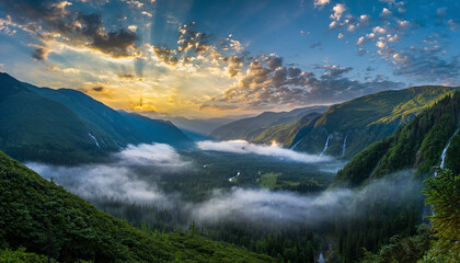 Vast Mountain Valley at Sunrise with Golden Light and Misty Landscape