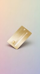 A close-up of a gold-colored credit card placed on a smooth, gradient background with soft lighting highlighting its metallic finish and embossed details