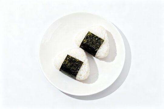 Japanese onigir on plate on a white isolated background.