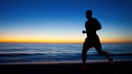 Silhouette of running man, athletic figure at sunset by the sea, with vibrant sky and calm ocean, close-up, copy space