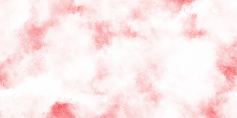 A softly blurred abstract background of watercolor washes in shades of pale red and white creates a delicate texture