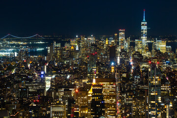 Naklejka premium Stunning Night View of Downtown Manhattan Skyline with One World Trade Center, New York City