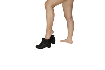 Close up of a woman's leg lifted up to put on women's ankle boots isolated on transparent background png file.