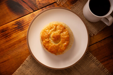 Bisquet. Also known as Bisquets Chinos, it is one of the traditional breads in Mexico, commonly consumed hot, cut in half and spread with butter and fruit jam.