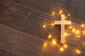 Cross and mini lights on a dark background