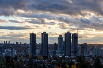 Fototapeta premium Skyline Of Burnaby High Rise Office Towers Under Construction In Greater Vancouver At Sunset