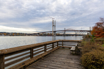 Obraz premium Riverside Boardwalk Over the Fraser River in New Westminster Under Construction With Crane