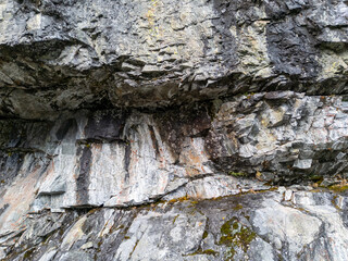 Rugged Rock Wall Formations Along a Cliff Face in British Columbia, Canada