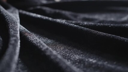 Shimmering dark fabric cascading in ripples - Powered by Adobe