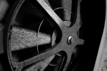 A close up of a fan with a black and white filter