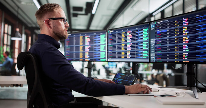 Young Male Billing Analyst Working - Powered by Adobe