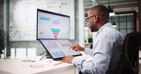 Analyzing Market Trends On Computer Screen