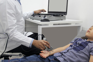 Electromyography EMG and Nerve Conduction Velocity NCV of the hand and arm in a 6-year-old Latina girl with a doctor