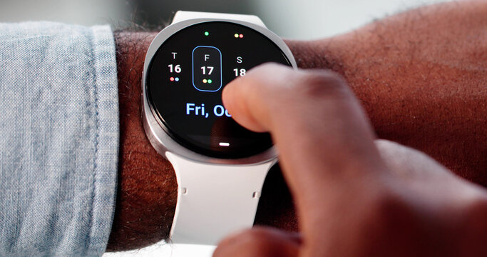 Busy Young Businessman Managing Schedule