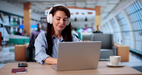 Focused Businesswoman Preparing Presentation On Laptop