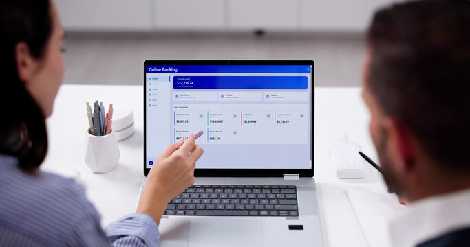 Financial Security: Young Couple Checking Savings Account Balance Online