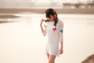 young woman in a white dress