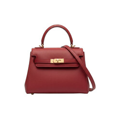 Elegant Red Textured Handbag With Golden Accents And A Detachable Strap Isolated On A Black Background