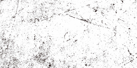 Rough grainy grunge texture featuring distressed speckles and various black particles are surrounding the white background, faded details, and raw vintage surface perfect for edgy design projects.