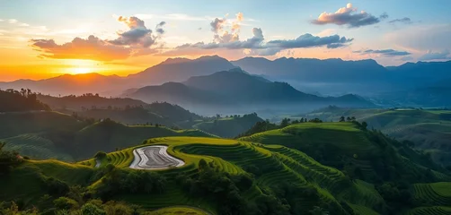 Keuken achterwand Rijstvelden Misty mountain range at sunrise, terraced rice fields, lush green valley,  breathtaking,  korea  © Teepanun