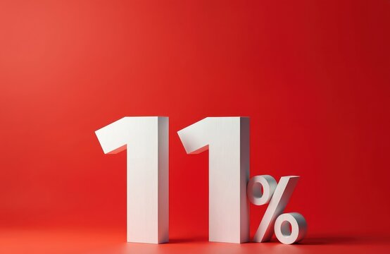 White volumetric number eleven and percent sign stand on bright red surface. Simple clean composition highlights offer discount sale or credit score.