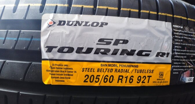 tire code specification label sticker and tire size on new Dunlop brand tires on May 30, 2023 in Bandung, Indonesia