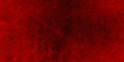 Dark red grunge texture background with heavy black vignette stain and old distressed vintage using for horror themes, rock music album covers.