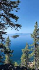 Obraz premium Serene view of island on calm blue water framed by trees on a sunny day