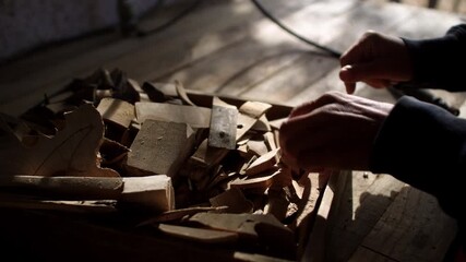 Crafting unique wooden pieces with skilled carpenter hands in workshop