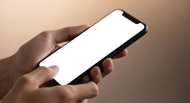 Close up of hands holding a modern smartphone with a blank white screen