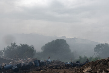 Fire at a household waste dump. Environmental pollution. Levoberezhny garbage dump. Poisonous substances of dioxins enter the air.  July 2021 Novosibirsk russia