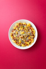 Pasta with bolognese sauce and cheese. Italian cuisine. Traditional recipe.