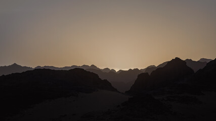 rocky mountains and desert landscape and sunset sky in Egypt