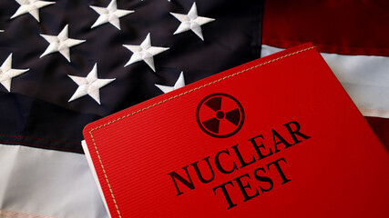 Fototapeta premium Nuclear Test folder with documents on American Flag