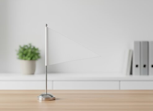 Small blank triangular desk flag mockup on a table