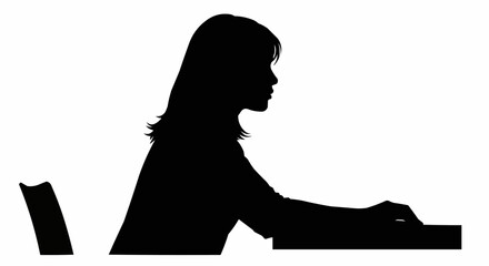 Silhouette of a woman working on a computer at a desk.