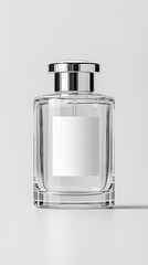A clear glass perfume bottle with a silver cap and a blank white label is presented against a clean, light gray background.