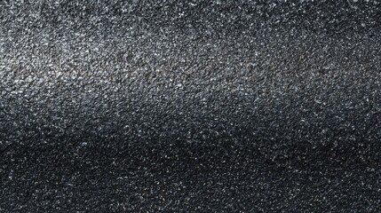 New asphalt surface shown from above, highlighting fine texture and realistic detail.