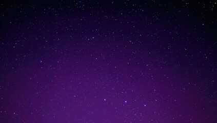 Fototapeta premium Night sky filled with stars over a purple background, seasonal change