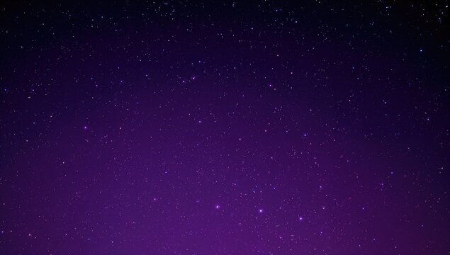 Night sky filled with stars over a purple background, seasonal change